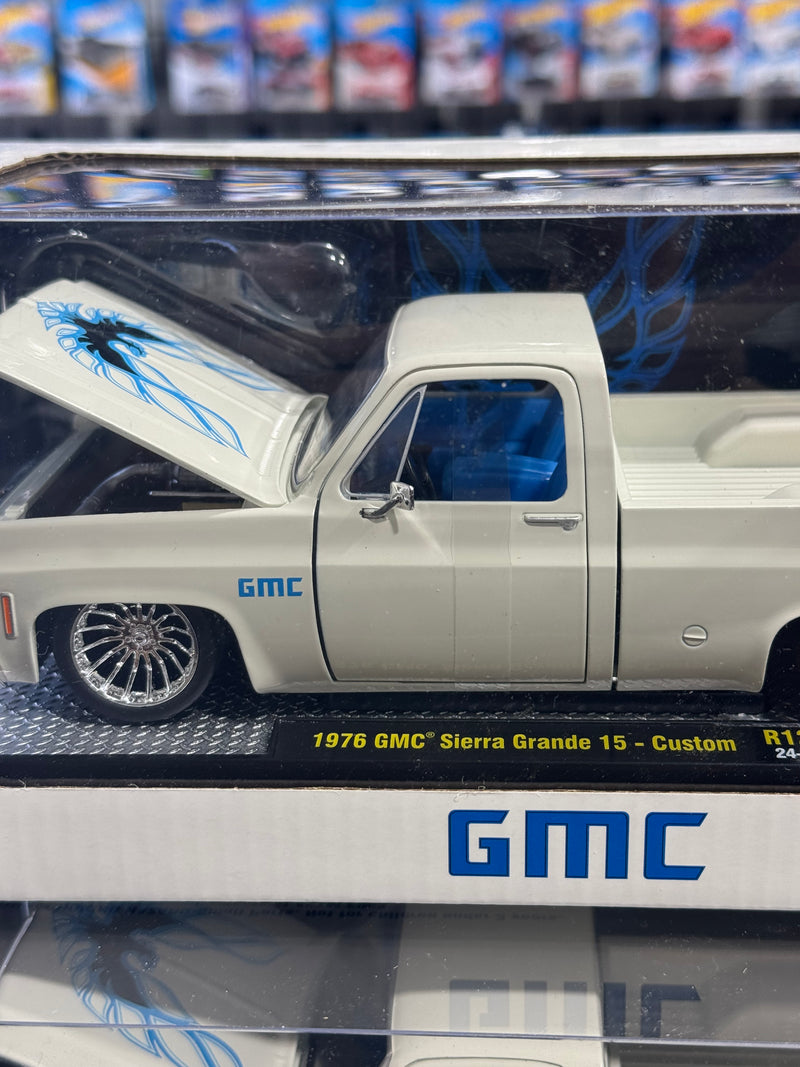 Load image into Gallery viewer, 1:24 Scale M2 Machines 1976 GMC Sierra Grande 15 Custom – White w/ Blue Trans Am Tampo- R127
