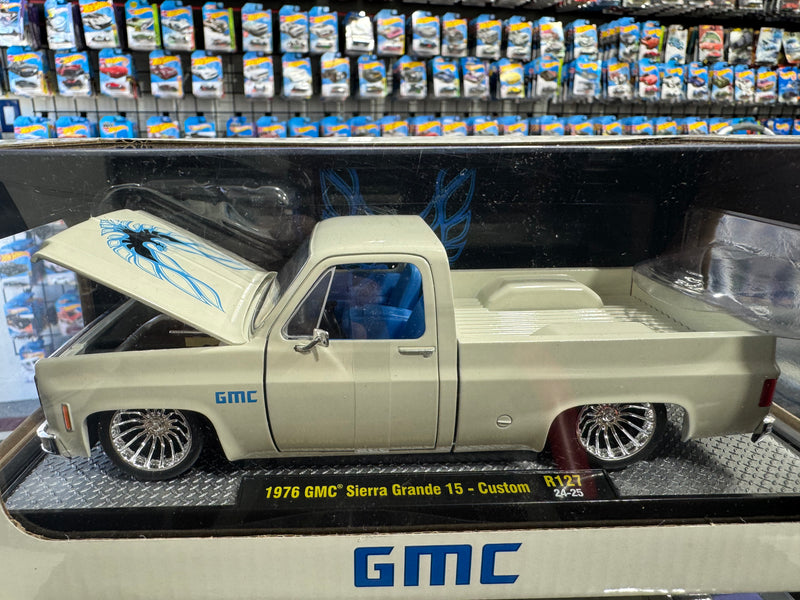 Load image into Gallery viewer, 1:24 Scale M2 Machines 1976 GMC Sierra Grande 15 Custom – White w/ Blue Trans Am Tampo- R127
