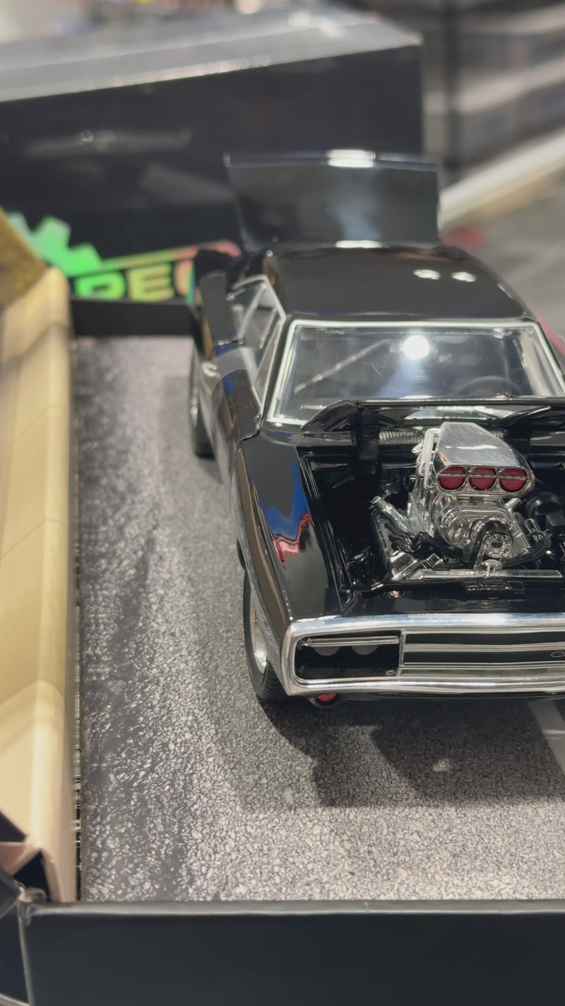 Load and play video in Gallery viewer, Jada Toys Wondercon Limited Edition True Spec Fast and Furious Dodge Charger
